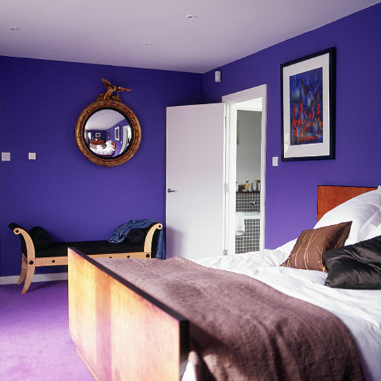 Purple walls with wooden bed | housetohome.