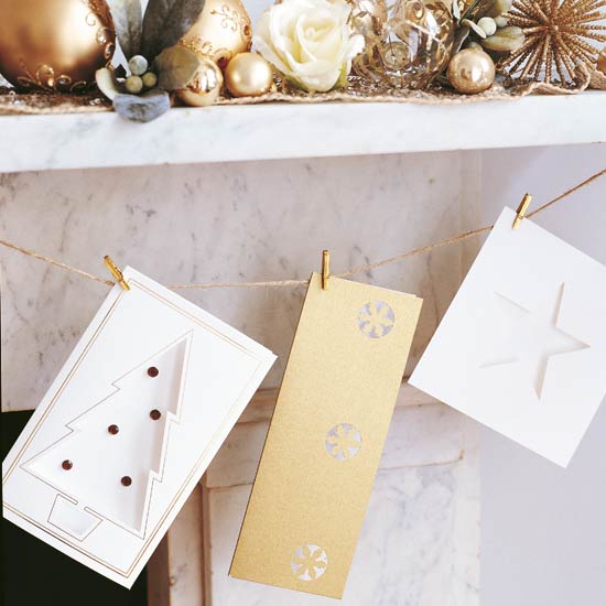 Hang Christmas cards with string to keep surfaces free