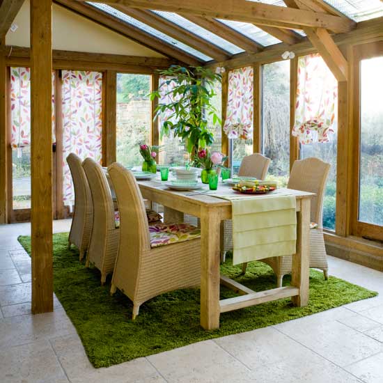 Conservatory dining room with beams