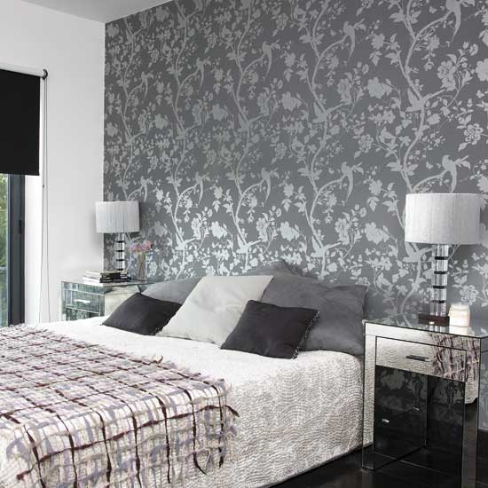 Bedroom with patterned wallpaper | Bedroom designs | Glass lamps ...