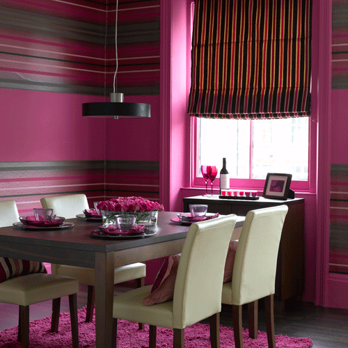 Dining room with pink horizontal striped wallpaper, vertical striped blind and pink rug