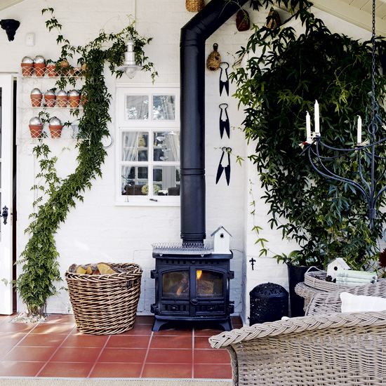 Conservatory with wood-burning stove