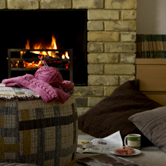 Cosy living room | Fireplaces | Pouffe | Image | Housetohome.co.uk