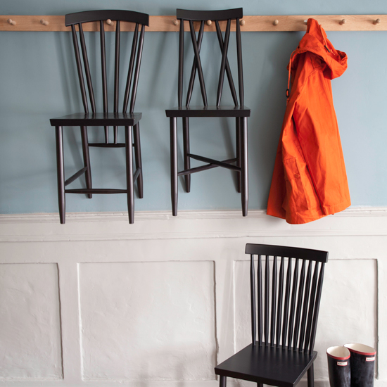 Surreal hallway with chairs hung on hooks | Weird and wonderful hallways | Hallway decorating ideas | PHOTO GALLERY