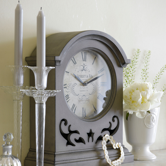 A mantel clock | Cosy fireplace ideas - 10 of the best | How to create a cosy fireplace | Fireplace design