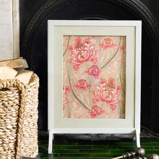 Hide a fireplace with a personalised fire screen | Cosy fireplace ideas - 10 of the best | How to create a cosy fireplace | Fireplace design