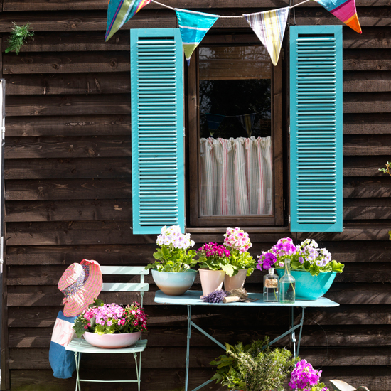Bright blue shutters | colourful garden ideas | how to add colour to your garden | colour week | housetohome