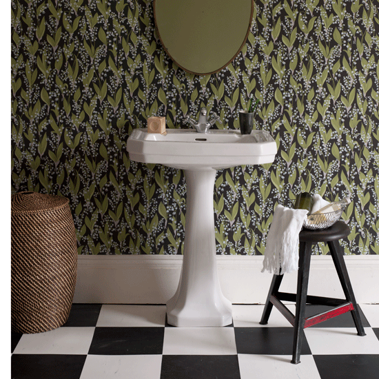 Green wallpapered bathroom