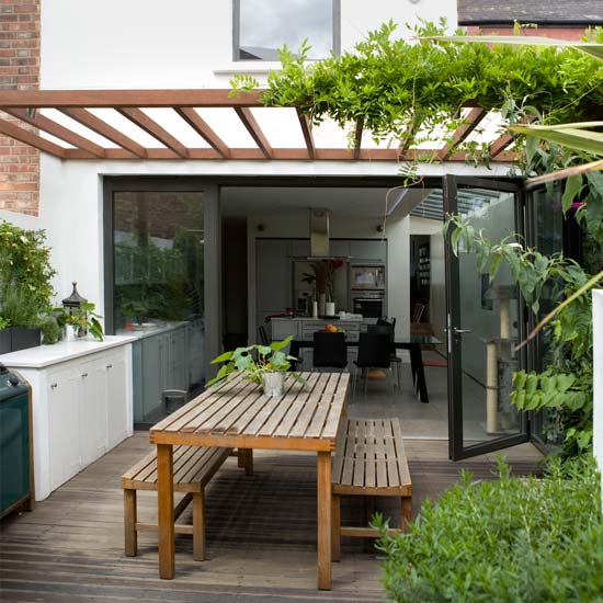 Garden decking area | Light-filled Victorian house tour | House tour | Modern decorating ideas | PHOTO GALLERY | Livingetc | Housetohome