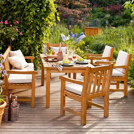 Cornwall table, £820; Summerfield bench, £680; Summerfield armchairs, £410 each, all Garpa.