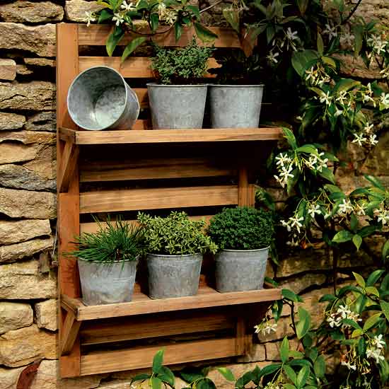 Wall-mounted rack with pots, £40, Notonthehighstreet.com