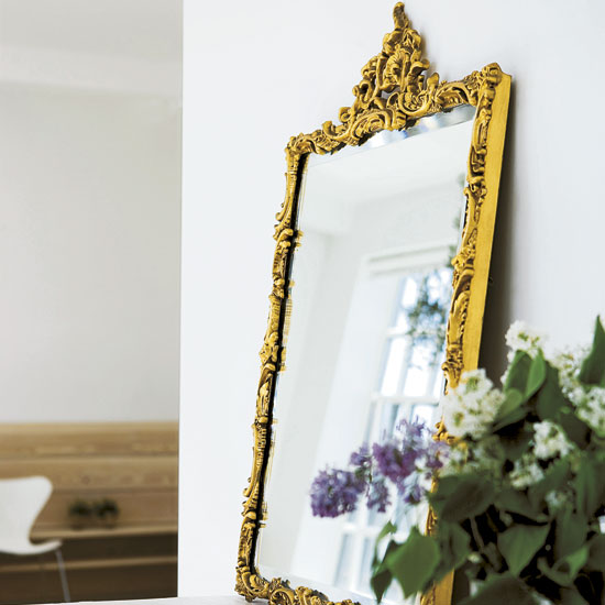 Gilt bedroom mirror | step inside a cool Danish loft apartment | modern home ideas | house tour | housetohome