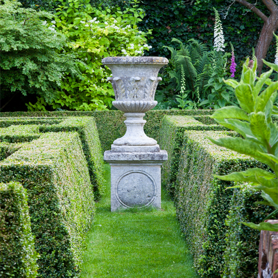 A hedge is a simple form of topiary used to create boundaries, walls or screens.