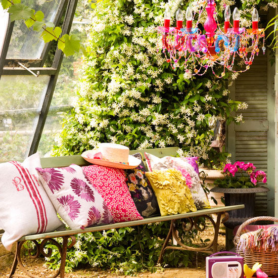 Cushioned love seat | how to create a garden retreat | garden design ideas | housetohome