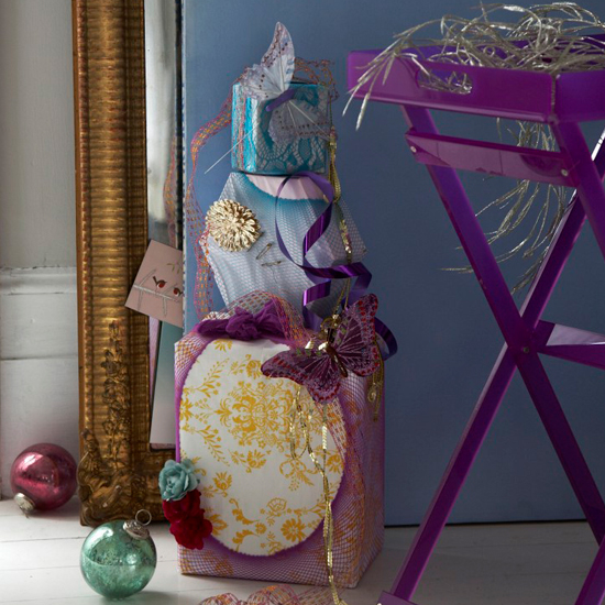 Cut up fishnet or lace-pattern tights and stretch over gifts for a trim that's feminine yet edgy.