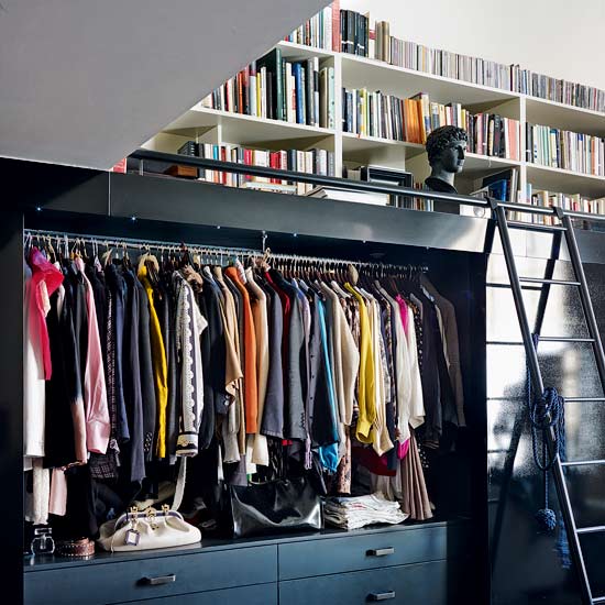 Wardrobes and library | Take a look inside a dark, dramatic apartment | Real life homes | PHOTO GALLERY | Livingetc