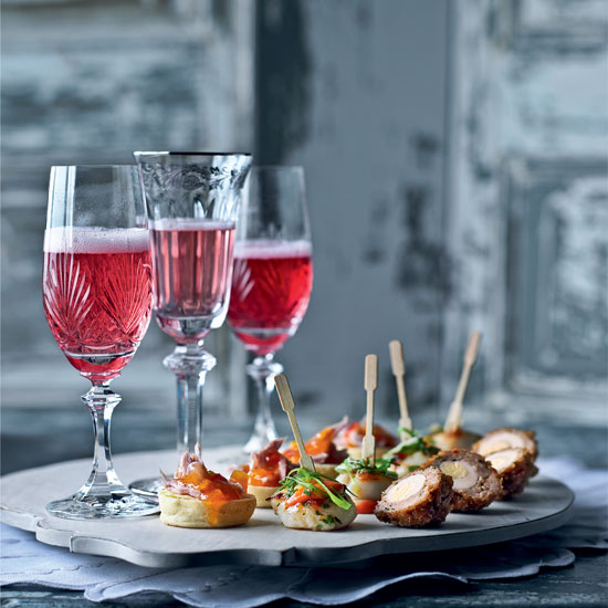 Serve this fizzy cocktail with a pleasing party platter