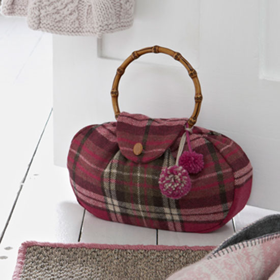Our fun doorstop features a lining bag filled with sand.