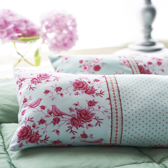 Transform your bed with some pretty floral cushions