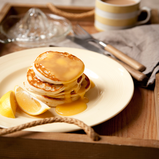 Pile up these fluffy pancakes on the plate and serve with the lemon sauce