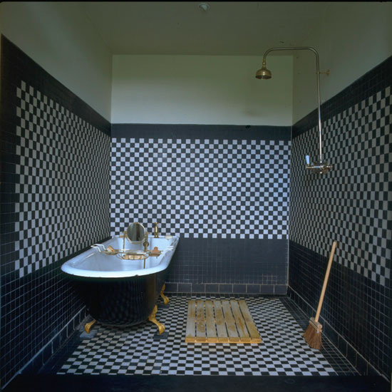 Dark & Handsome Classic black and white tiled bathroom with brass fittings | Freestanding bath | Bathroom decorating ideas | Housetohome | PHOTOGALLERY