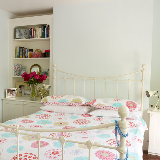 Main bedroom | Laura's colourful house tour | bedroom | metal bed | colourful bed linen | PHOTO GALLERY | Style at Home | Housetohome