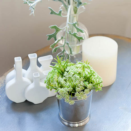 Table top | Table top display of vases, greenery and candle | Country house | Homes & Gardens | PHOTOGALLERY