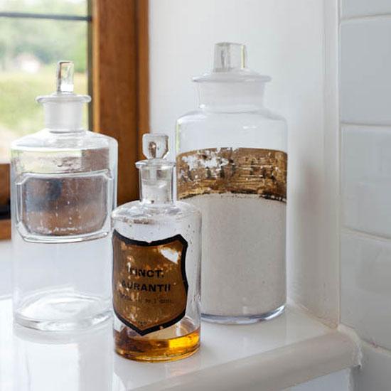 Bathroom Vintage pharmacy jars in white bathroom | Country house | Homes & Gardens | PHOTOGALLERY