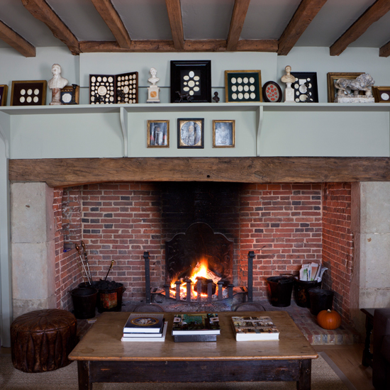 Show off a traditional Regency fireplace Traditional fireplace with busts | Classic British decorating ideas to celebrate the Queen's Jubilee