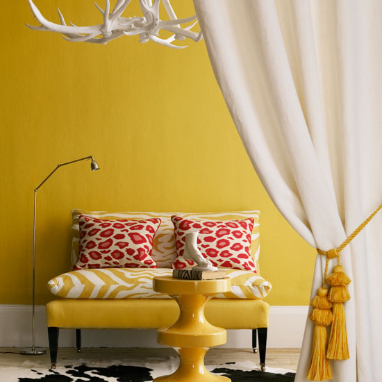 Mix and match prints Yellow sitting room with antler chandelier | Decorating with animal print | Decorating ideas | Room idea | Homes & Gardens | Housetohome | PHOTOGALLERY