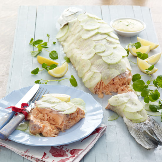 Roasting a whole salmon feels extravagant but works out cheaper if you’re feeding a crowd. Serve with lemon wedges, watercress leaves and chive-flecked mayonnaise.