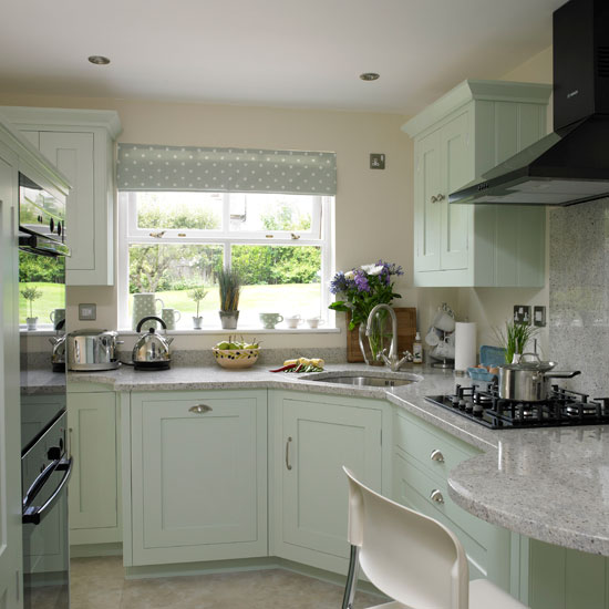 Soft green country kitchen