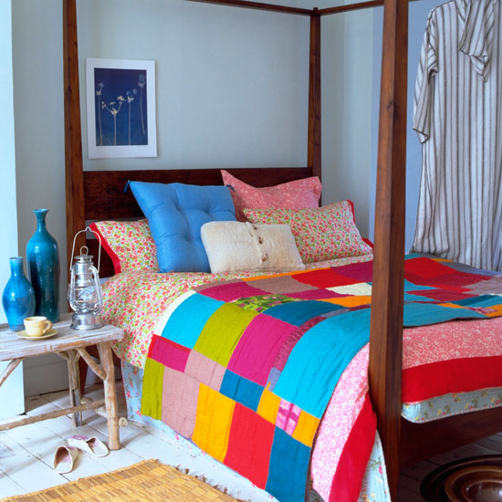 Choose brightly-coloured fabrics Blue bedroom with colourful bed linen | Summer bedroom decorating ideas | PHOTO GALLERY | Homes & Gardens | Housetohome.co.uk