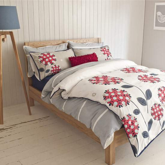 Tongue and groove is ideal for creating a country or coastal-style bedroom. Bedding from £24 at BHS