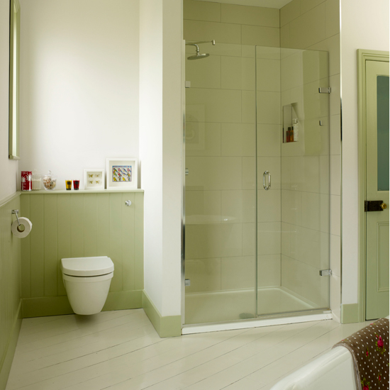 Green bathroom with alcove shower 