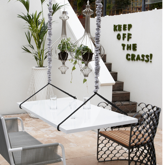 Quirky white patio garden