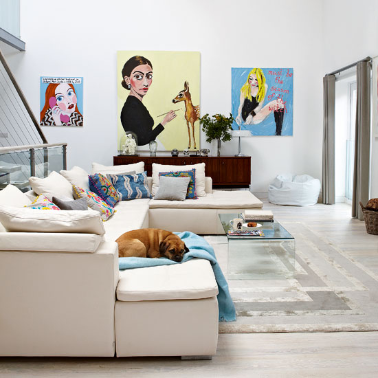 White living room with artwork