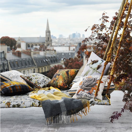 Fragment Tartan throw; Fidèles Two Birds cushion (centre), both from the Autumn range