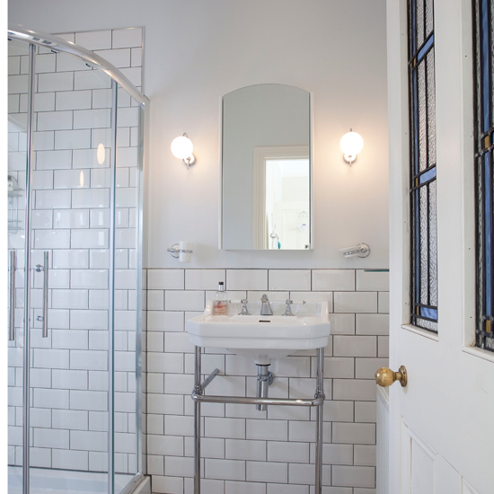 White tiled shower room