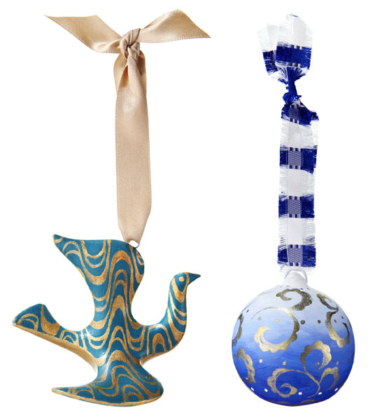 Hand-painted baubles by Jonathan Adler (left) and Tricia Guild (right) celebrate their inimitable styles.
