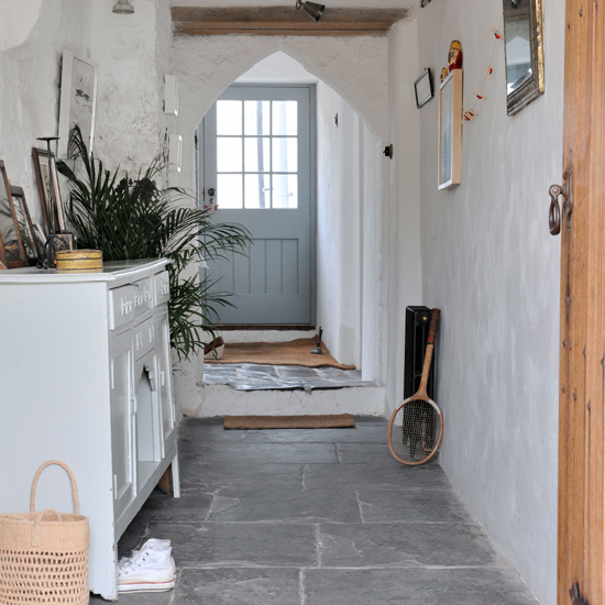 Stone flagged white country hallway
