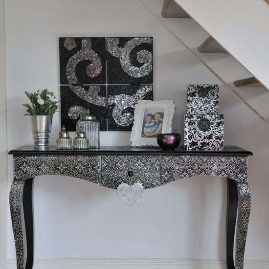 Hallway with silver console table