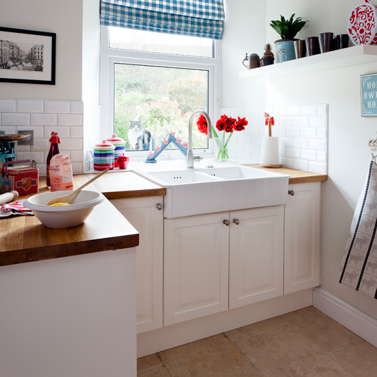 White country-style kitchen with butler sink