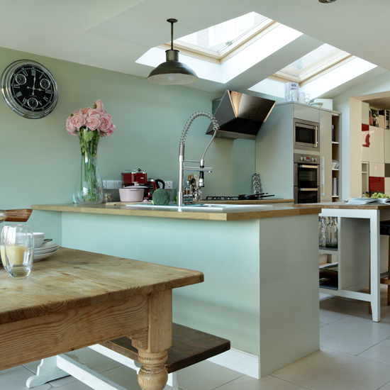 Pale green and oak kitchen