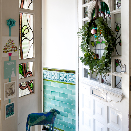 Turquoise and white Christmas hallway