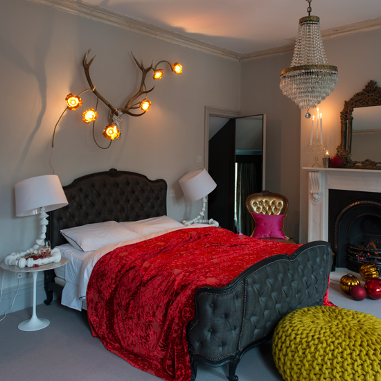 Modern bedroom with black upholstered bed