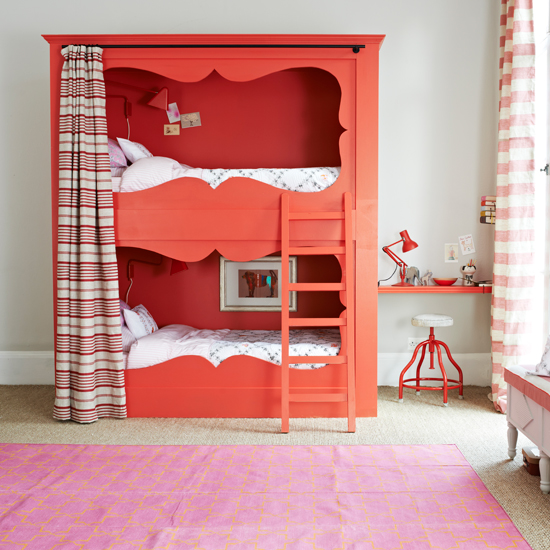Red and white bedroom with bunk bed
