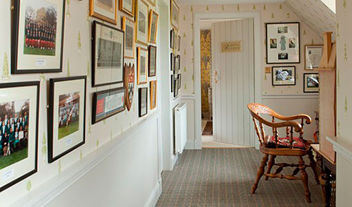 Light and airy hallway with photographs