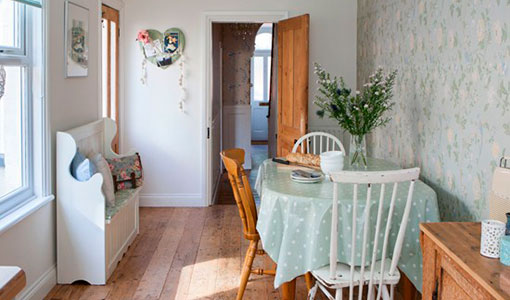 Green and white country dining room
