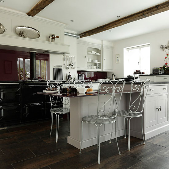 Step inside a glass and metallic kitchen with a modern edge